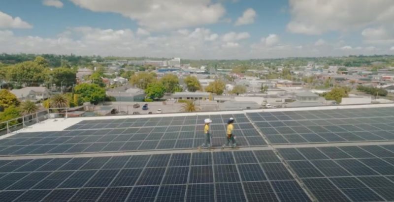 Workers on roof with solar